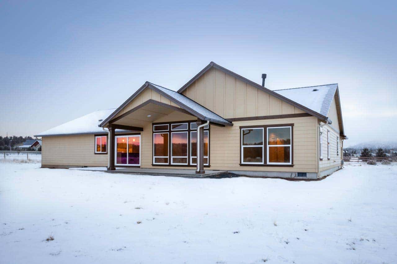 Exterior photo of new custom home in snowy Madras, OR